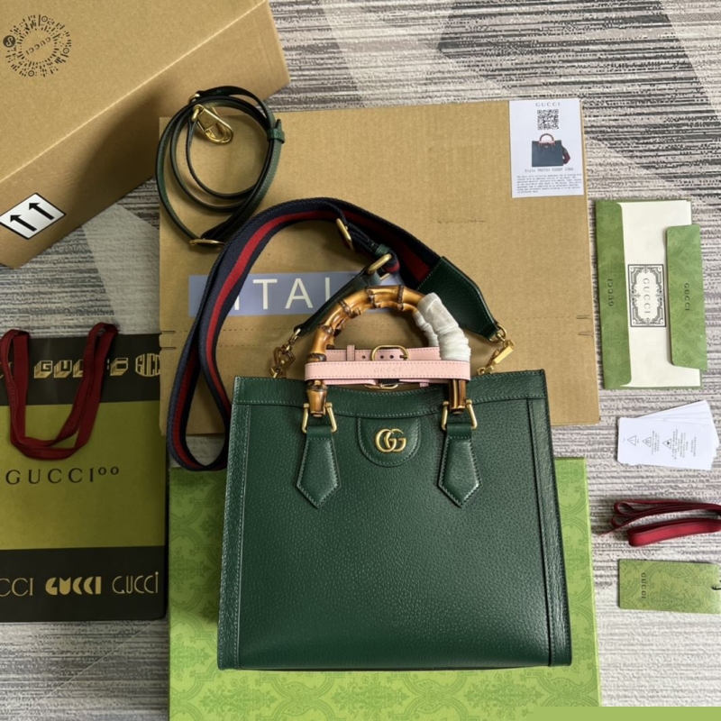 G*u*i top handle bags